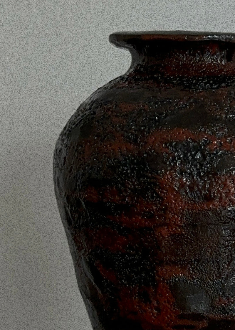 textured ceramic vase, red and black